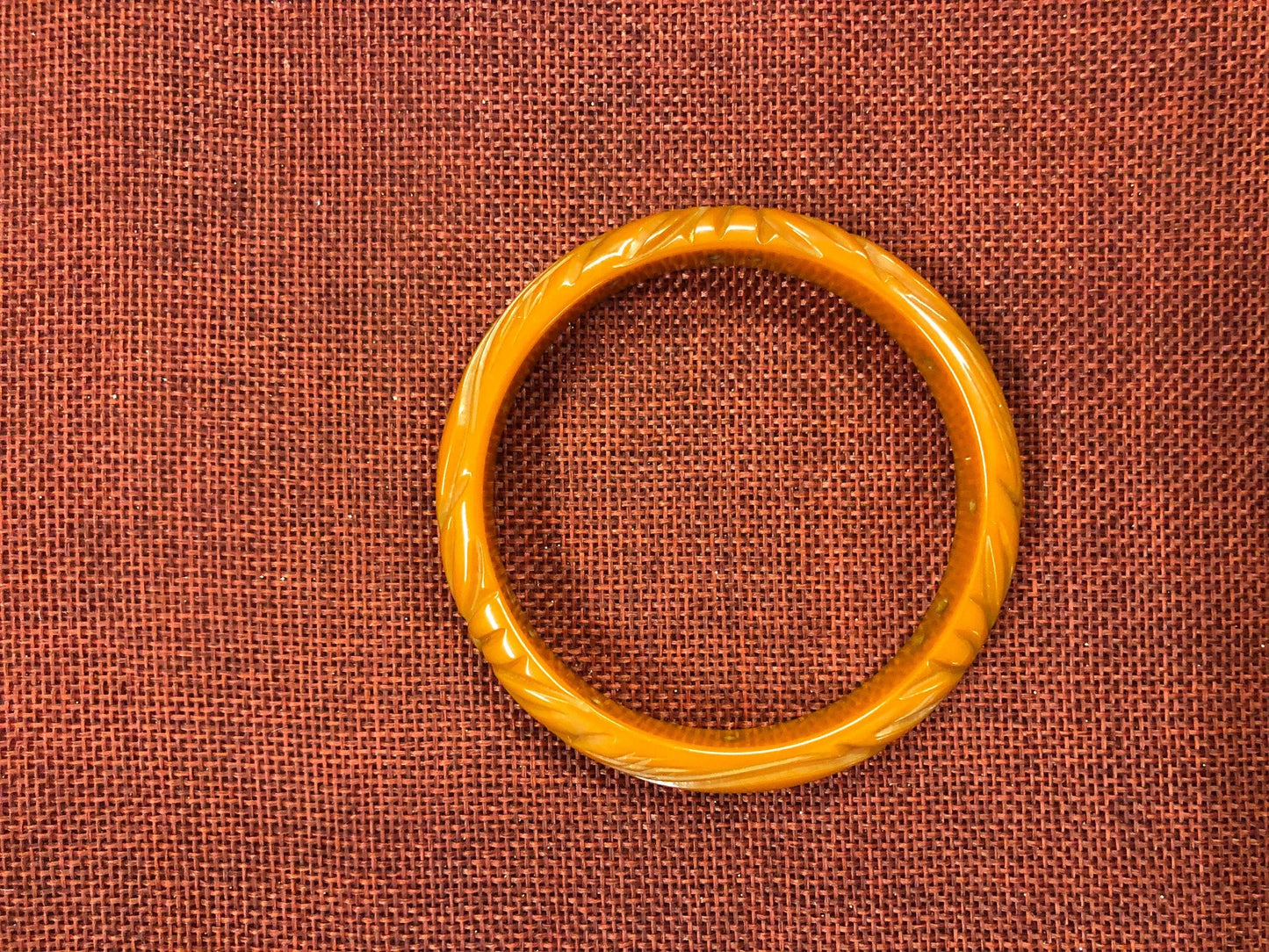 Bakelite Carved Rust Orange Bangle Bracelet - Vintage