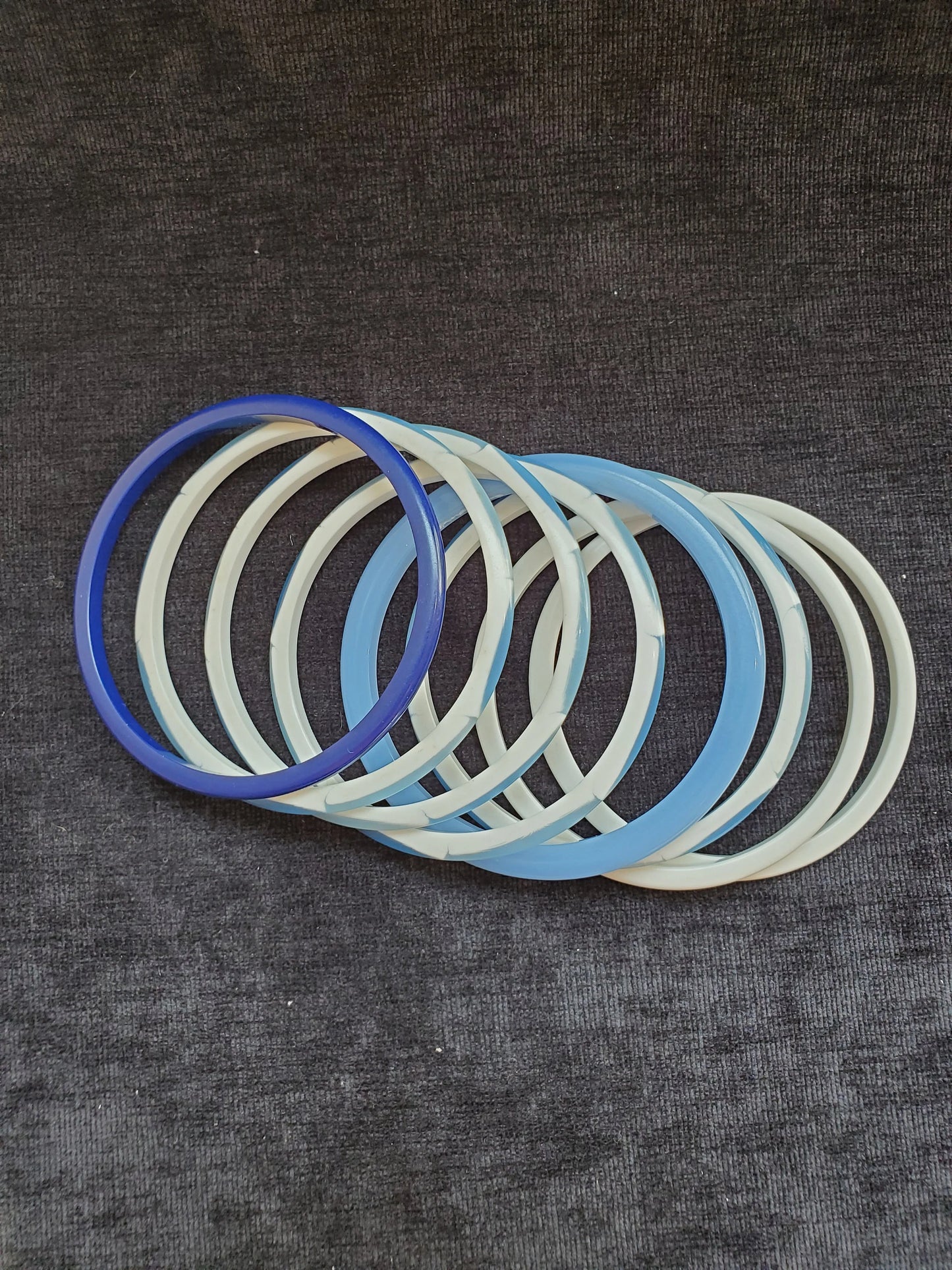 Eight Plastic Blue and White Bangles