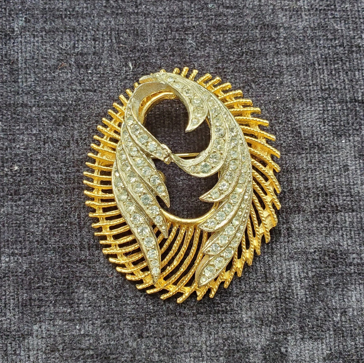 Gold Brooch/Pin With a Swirl Wreath Encircling Crystal Pave Wings