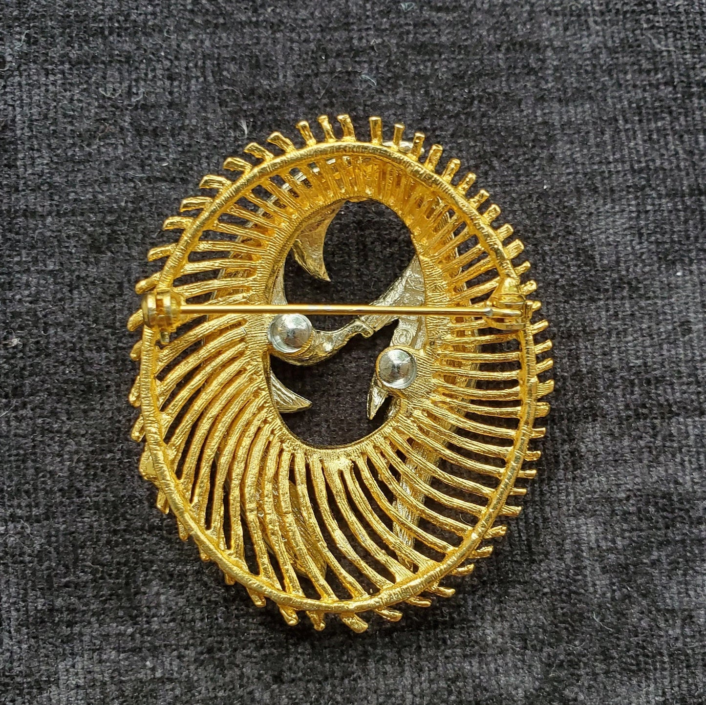 Gold Brooch/Pin With a Swirl Wreath Encircling Crystal Pave Wings