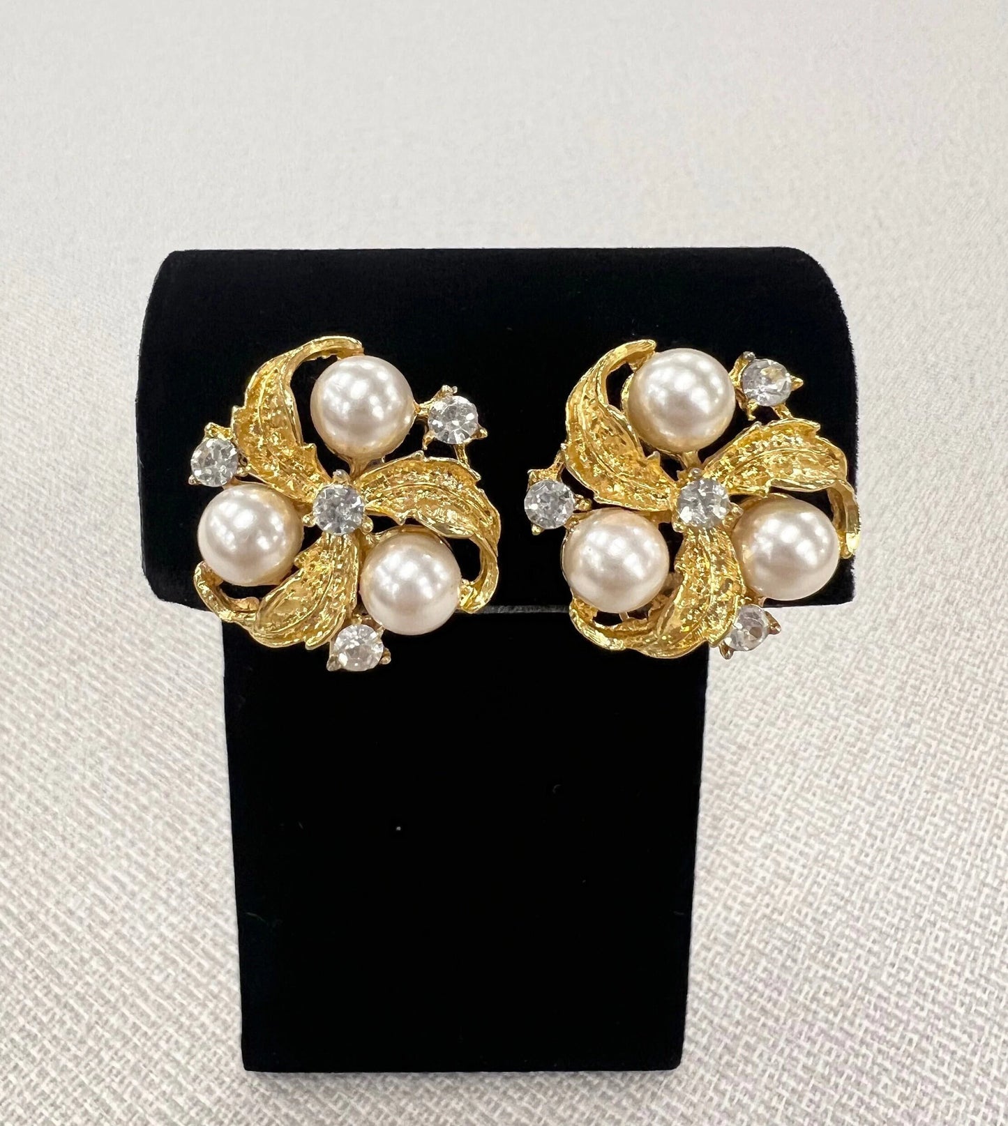 3 Gold Leaves Gripping Pearls with 4 Glistening Austrian Crystals