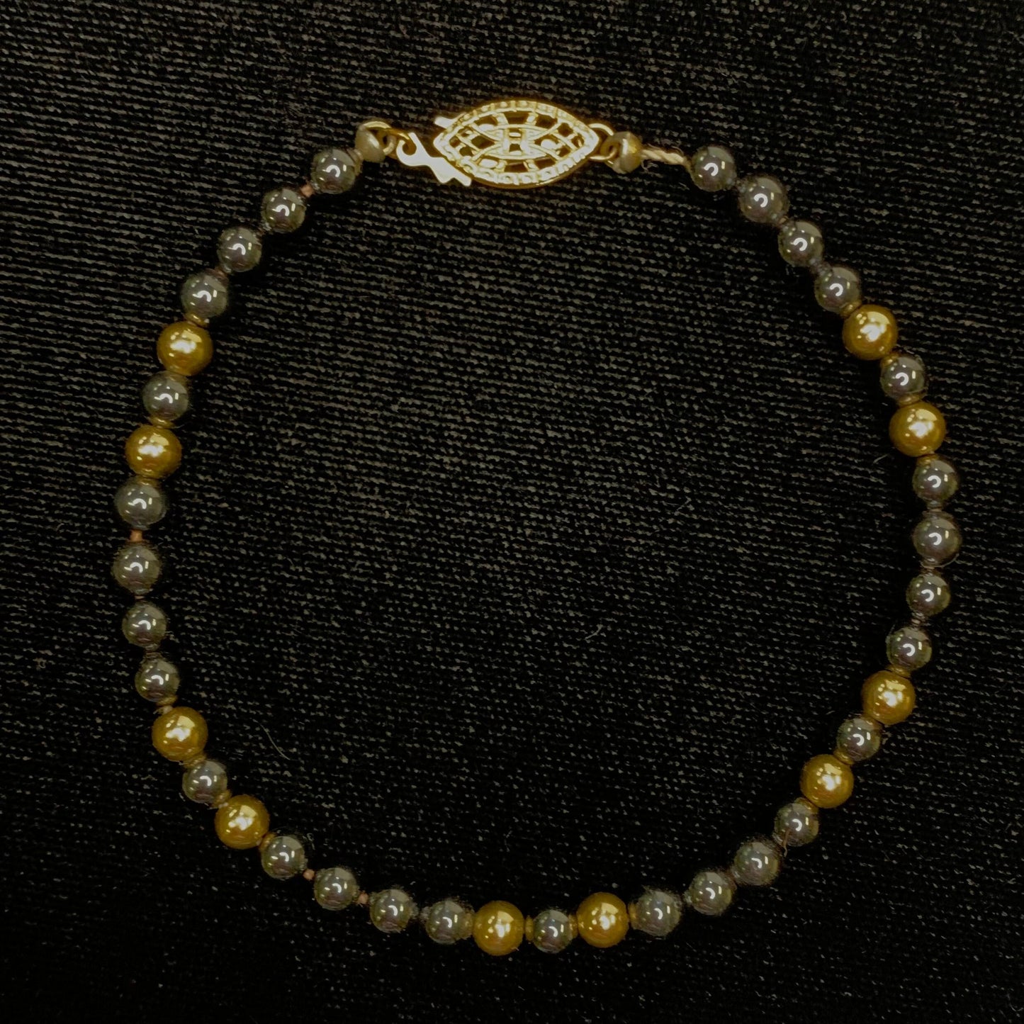 Hematite and 10 Karat Gold Beaded Bracelet