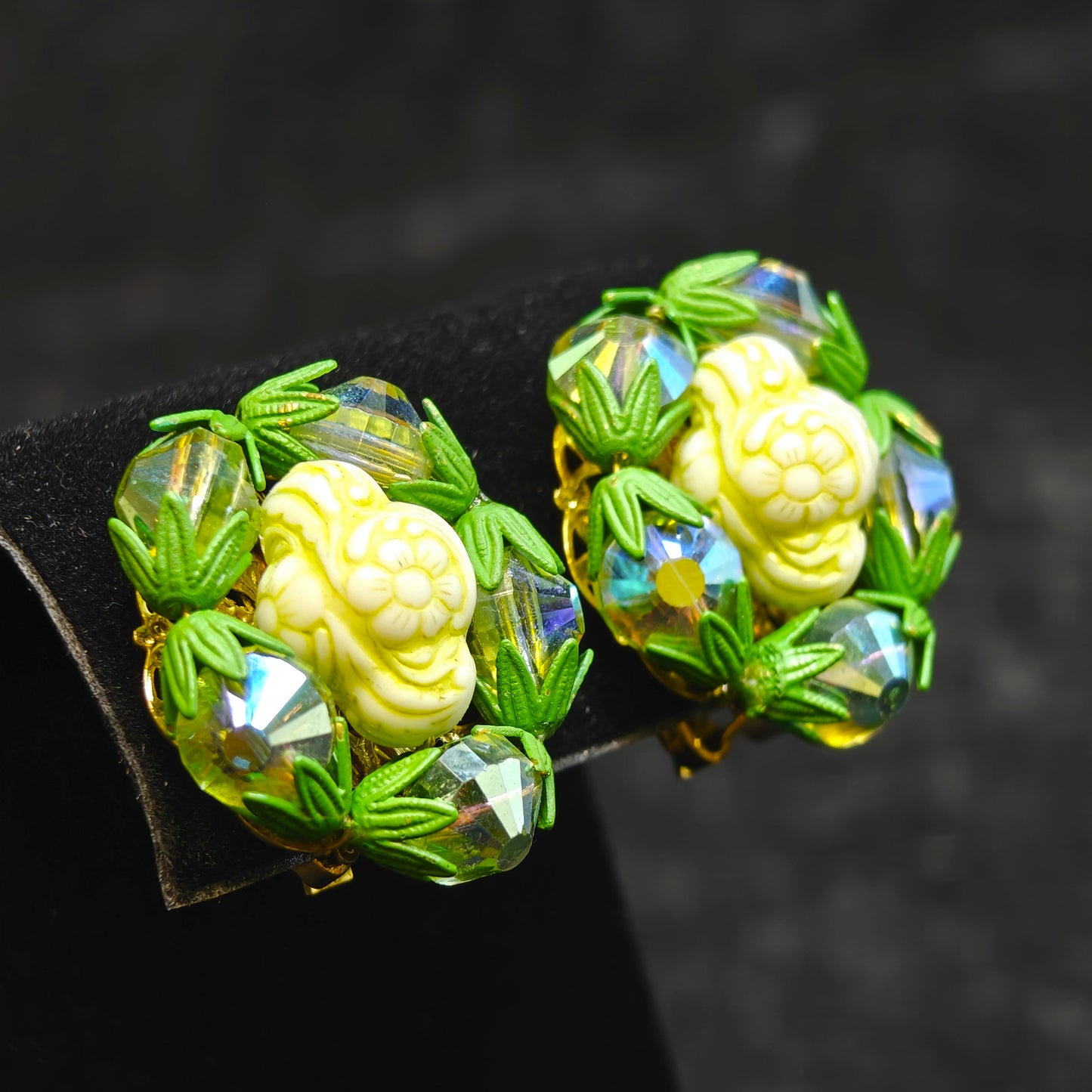 with Green Crystals Surrounding a Creamy Carved Center Settings - Hobe Earrings in Green and Cream