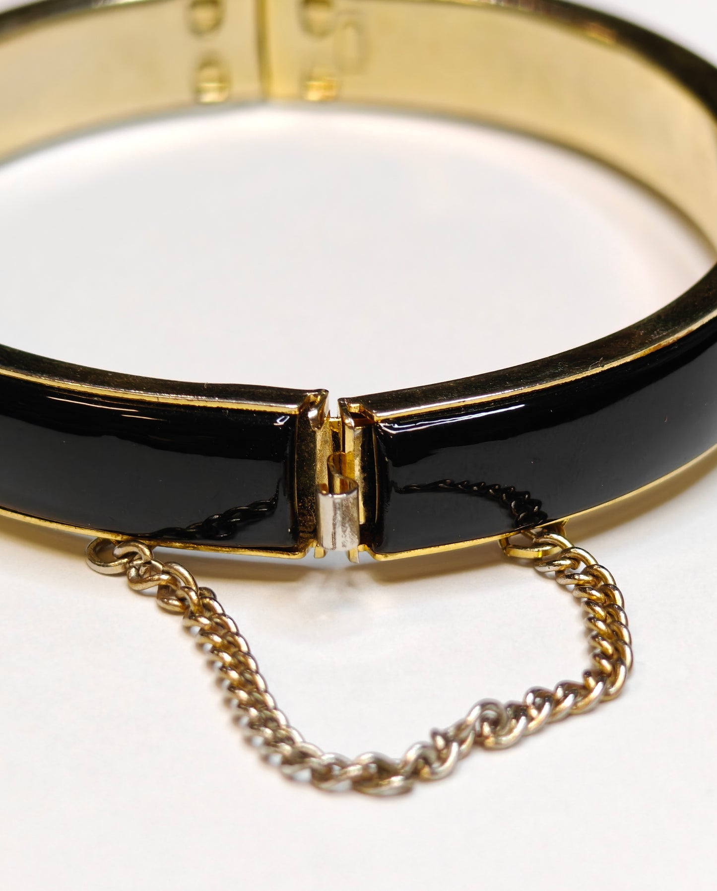 Hinged Bangle Bracelet in Black Enamel and Gold with Safety Chain