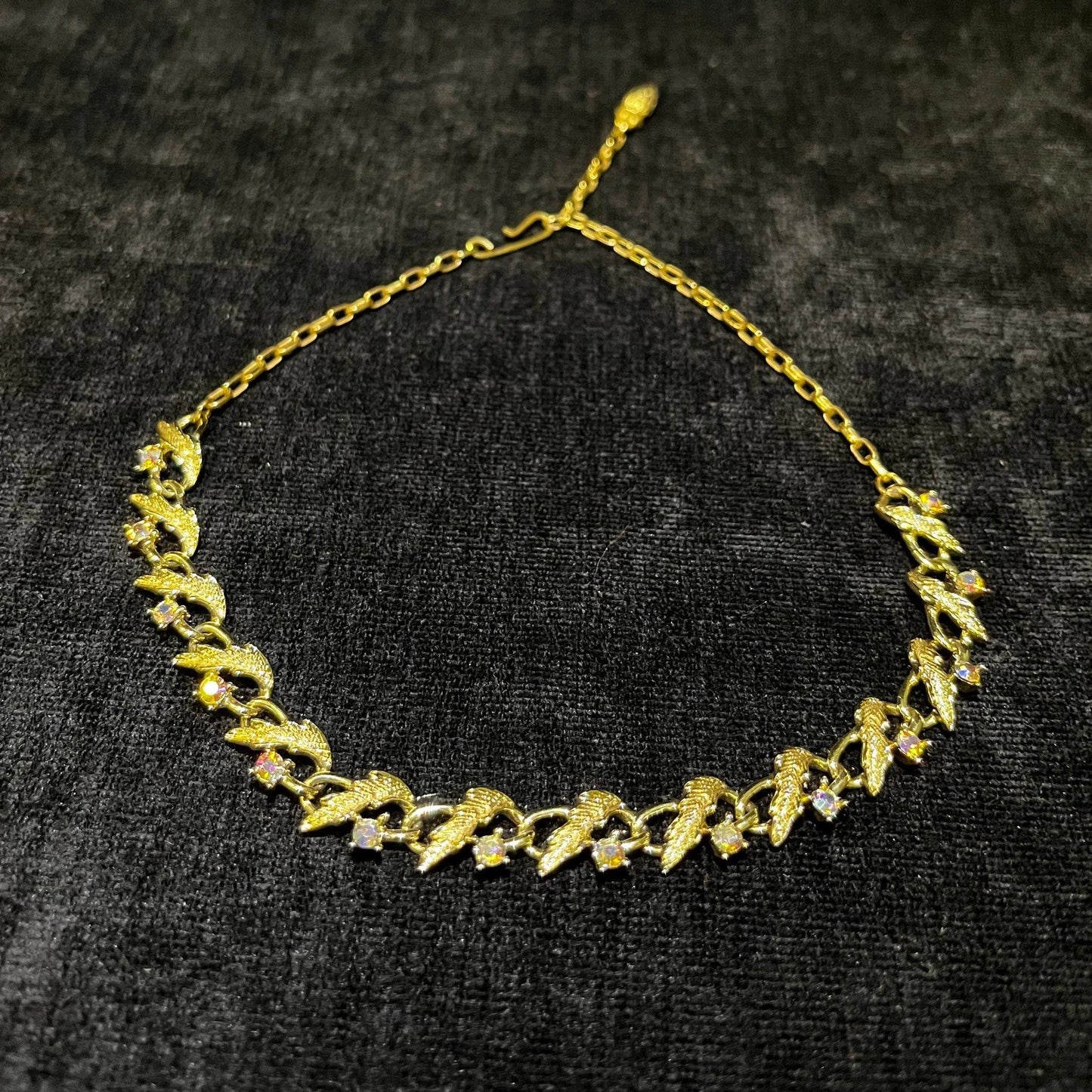 Sweet Delicate Gold Leaf Choker Necklace With Aurora Borealis Mounted Along The Lower Edge