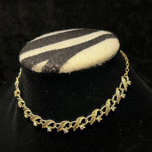 Sweet Delicate Gold Leaf Choker Necklace With Aurora Borealis Mounted Along The Lower Edge