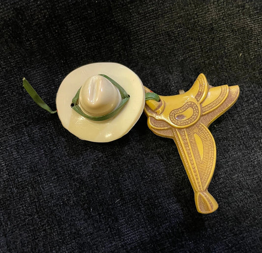 Saddle and Cowboy Hat Celluloid Pin Brooch