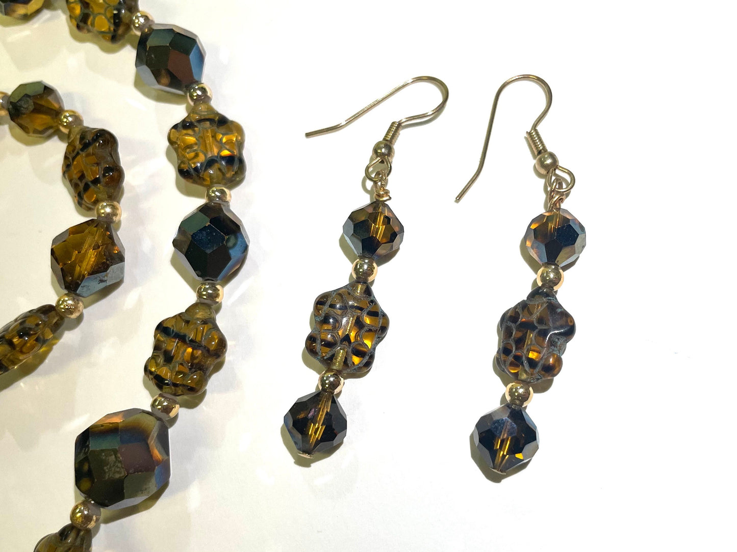 Aurora Borealis Austrian Crystal Settings With etched Murano Glass Tortoise Shell Beads in Honey and Black Colors. Sold as a Set