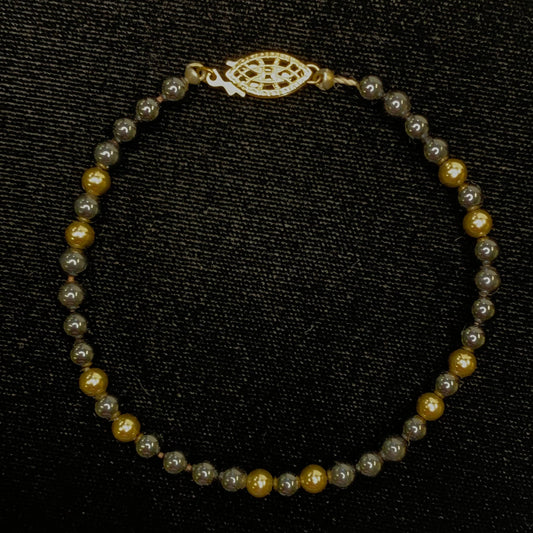 Hematite and 10 Karat Gold Beaded Bracelet