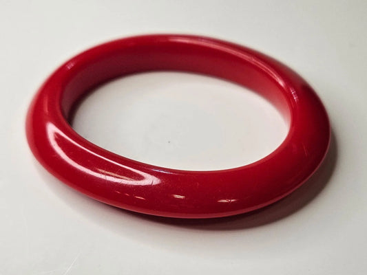 1950s Red Plastic Bangle- Oblong Sculpted Outer Edge